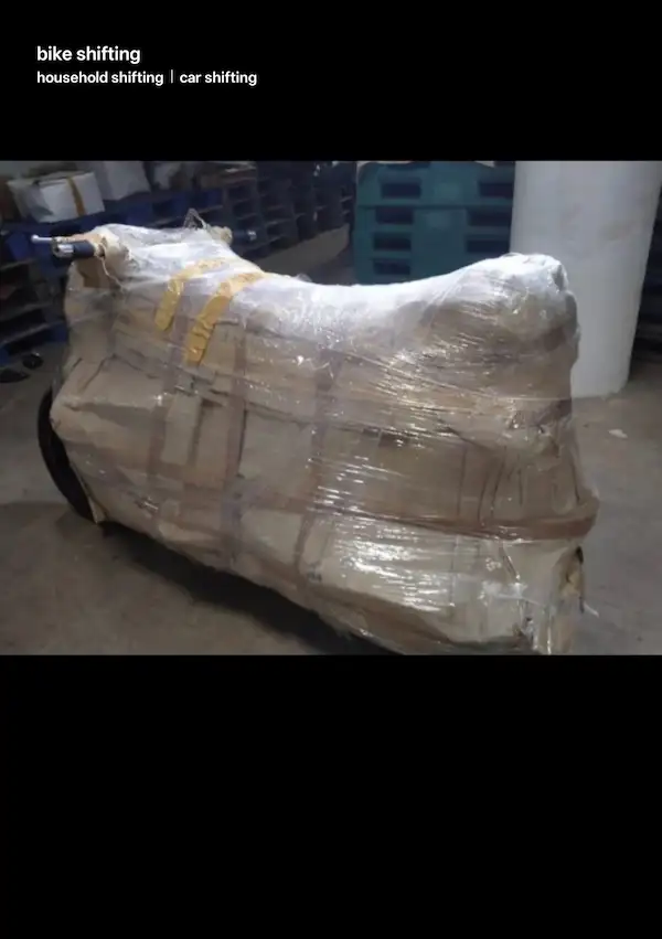 Commuter scooter packed for long-distance transit in Makarpura
